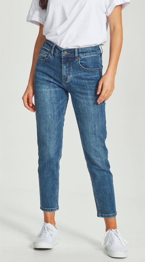 mid waisted straight leg short length dark blue jean