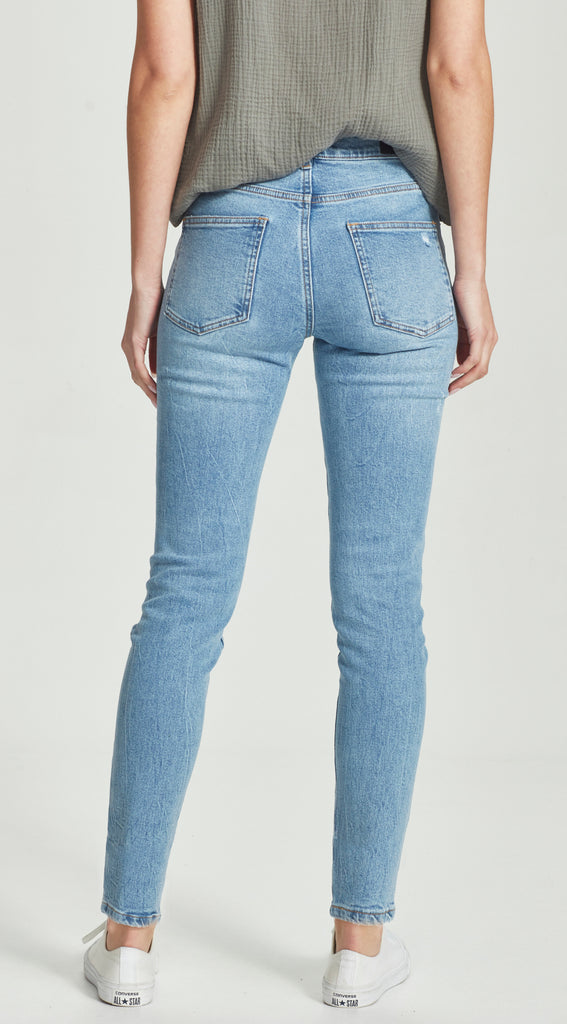 long length blue ripped boyfriend jean